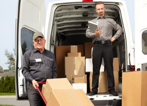 Man and van loading furniture in Watford