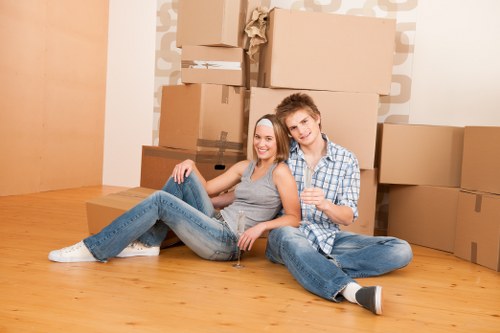 Moving truck and packed boxes for removals in Watford