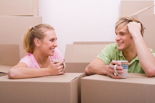 Removals team handling flat moving access in Watford