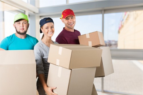 Preparation for a flat move including boxes, furniture, and packing materials