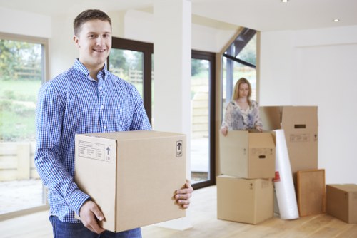 Professional office removals in Watford with moving boxes and desks