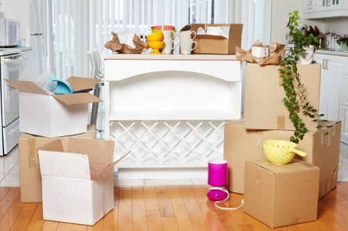 Office relocation team preparing commercial items for transport