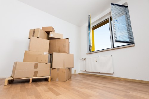 Wardrobe and moving boxes prepared for a home move in Watford