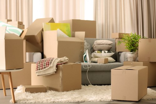 Organised office move with labelled boxes and workstation items