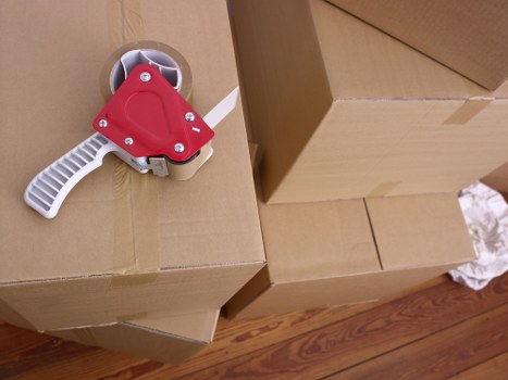 Preparing office boxes and furniture for a business move in Watford