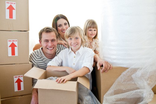 Packing boxes and furniture for a Watford home move