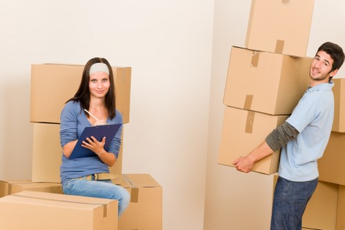 Loading furniture into a van for a Watford relocation
