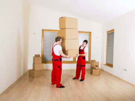 Moving van loading household items during removals in Watford